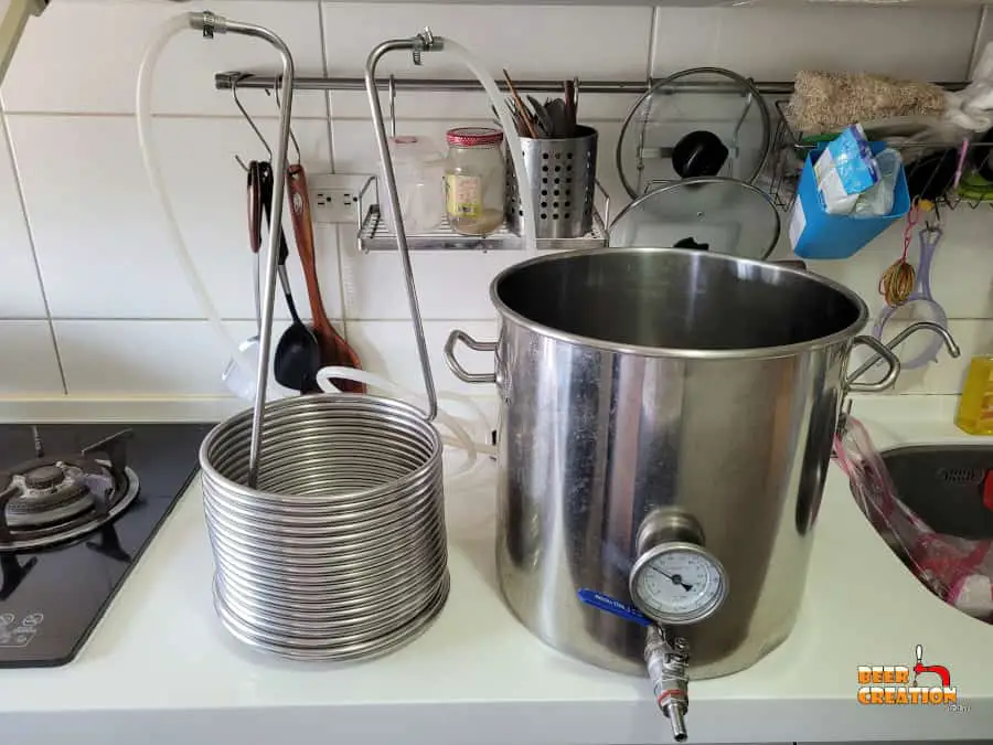 picture of a immersion wort chiller and brew kettle on a worktop
